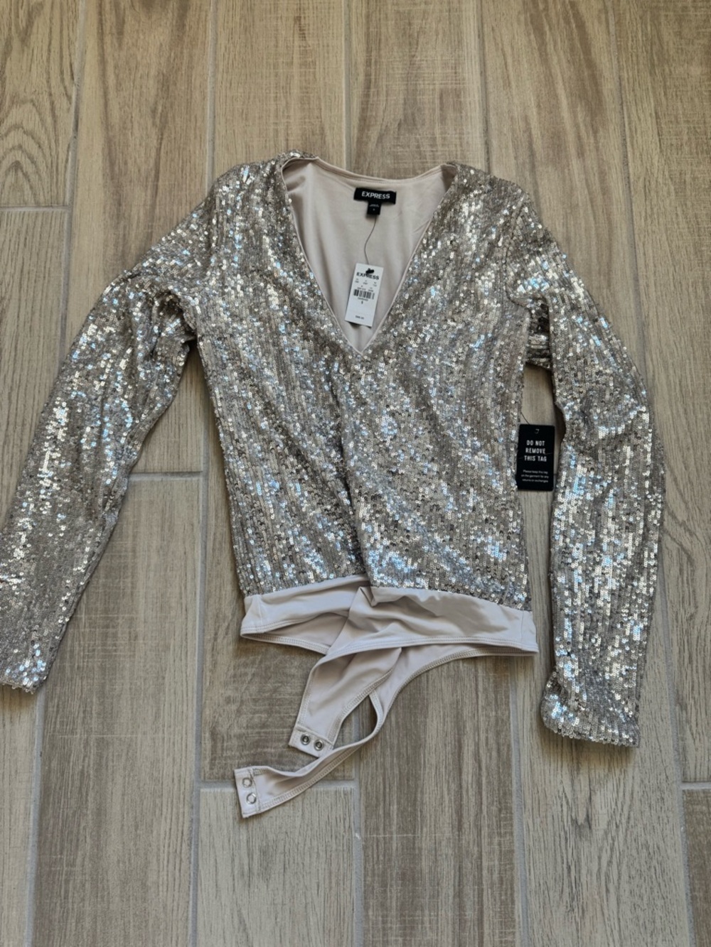 Express Sequin V-Neck Long Sleeve Bodysuit in Champagne